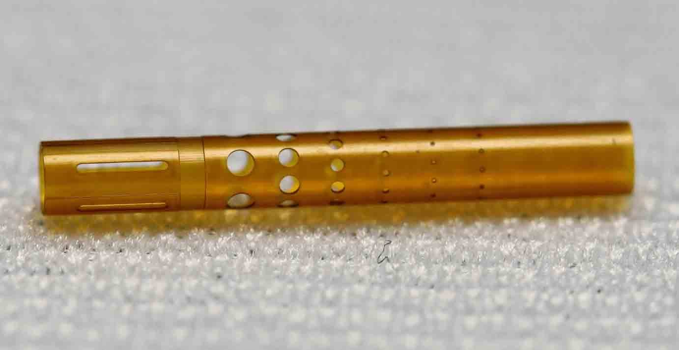 miniature polyimide tubing with varying sizes of holes cut out